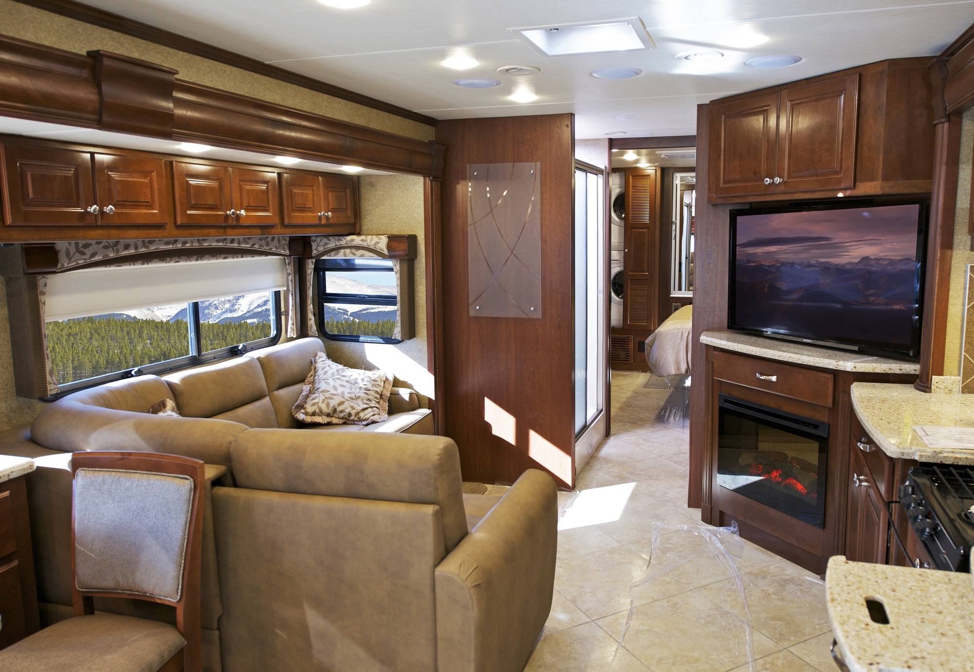Modern RV Interior. Class A Spacious and Luxury Interior with Large LED Television.